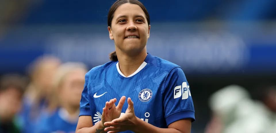 Chelsea player applauding during warm-up session