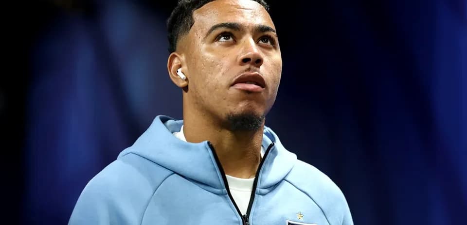 Player wearing England hoodie before match