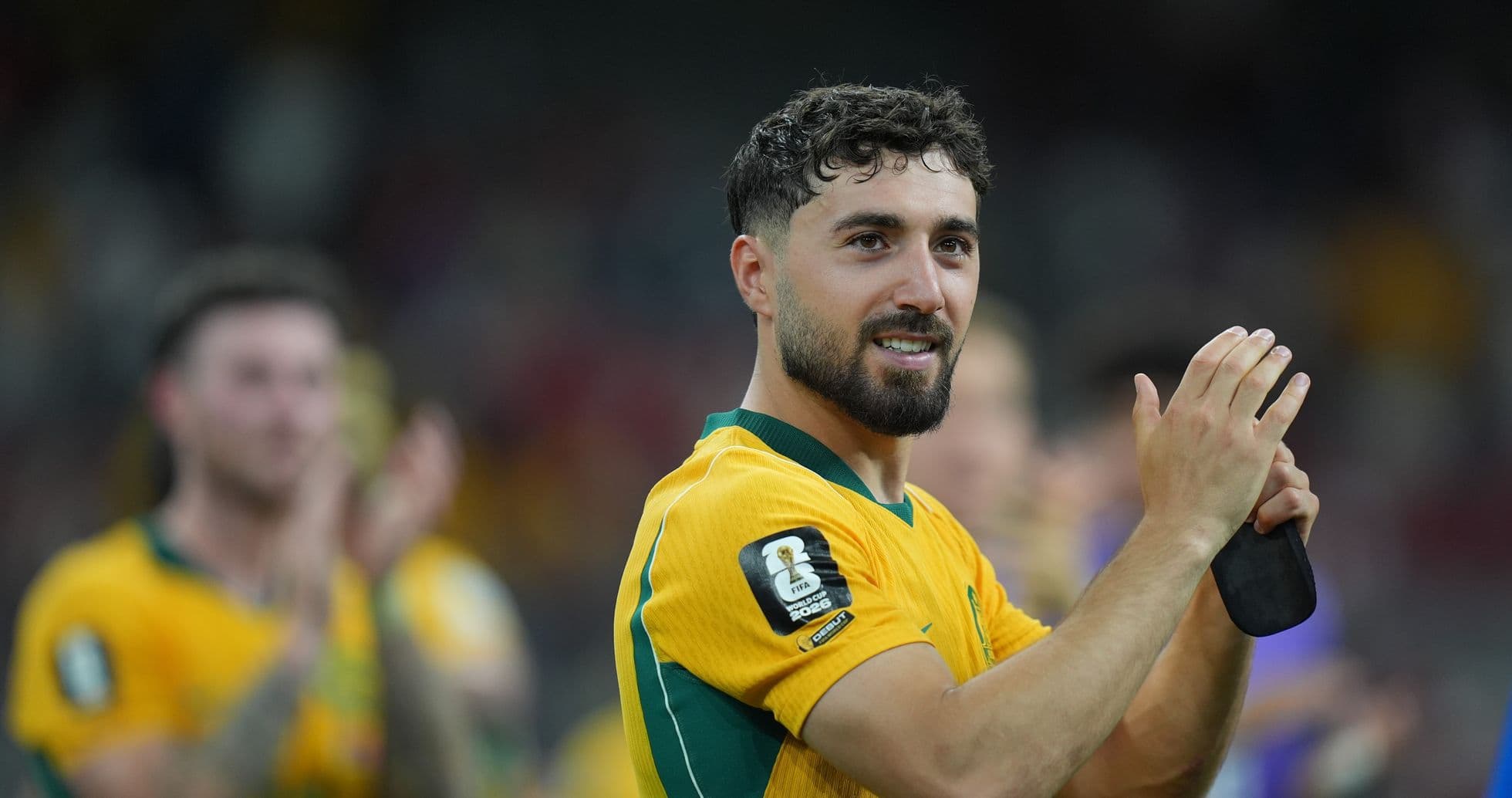 Player applauding fans after the match