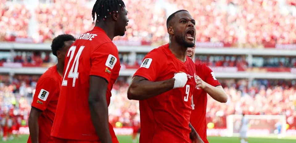 Canada players celebrating a goal during match
