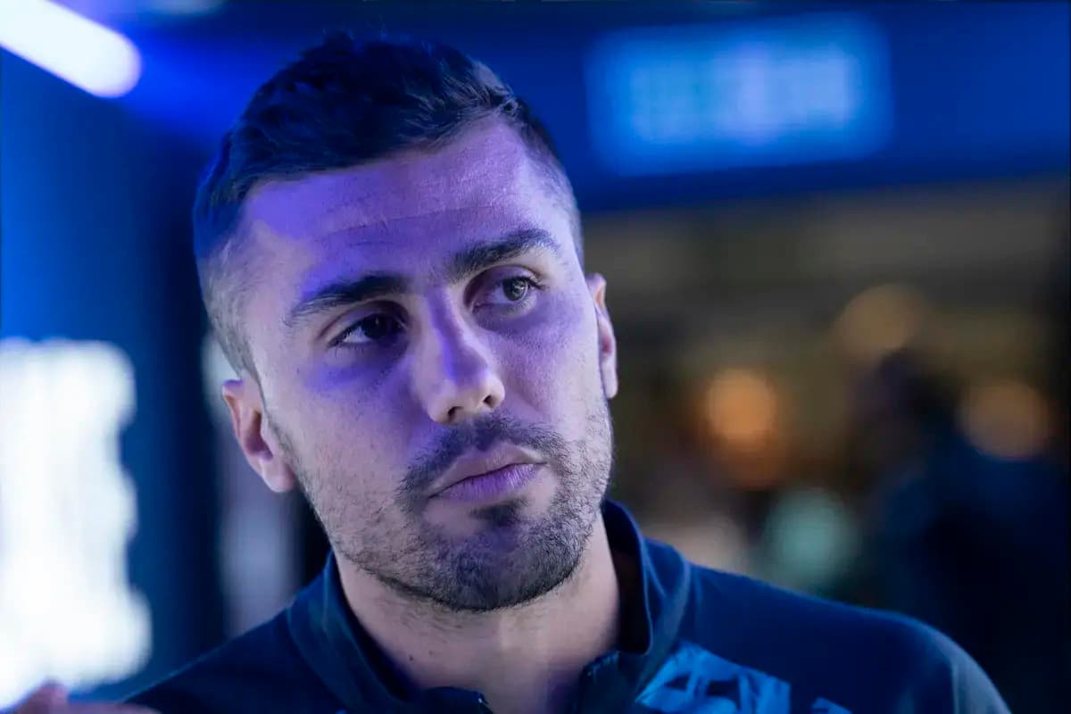 Athlete with short hair in blue lighting
