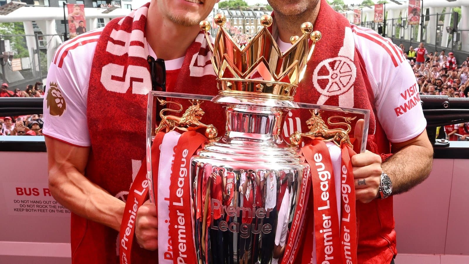 Players celebrating with the Premier League trophy