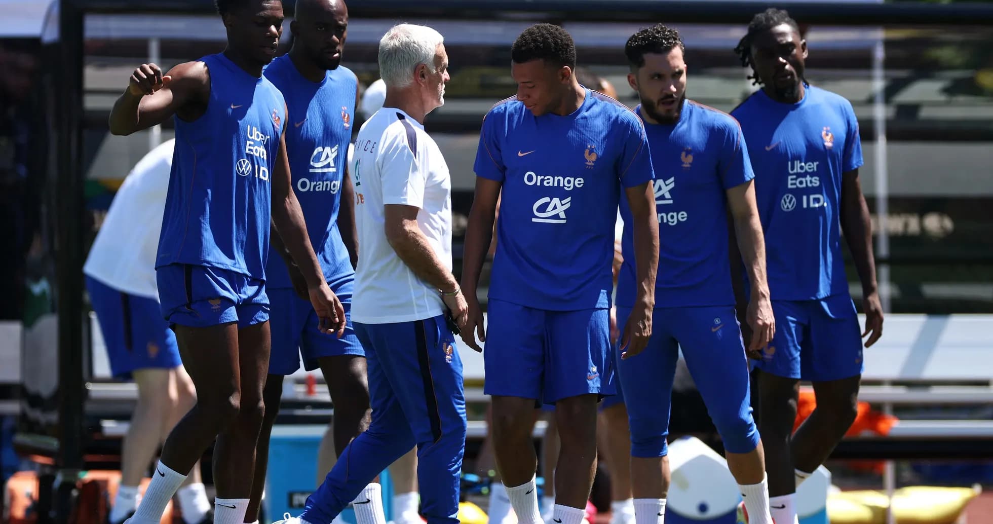 France team training with coach on the pitch