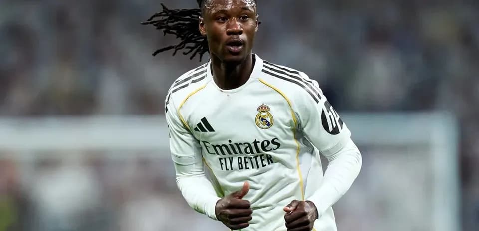 Player running during match in Real Madrid kit