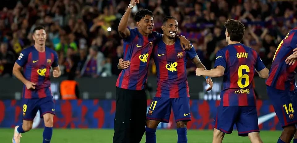 Barcelona players celebrating a goal during match