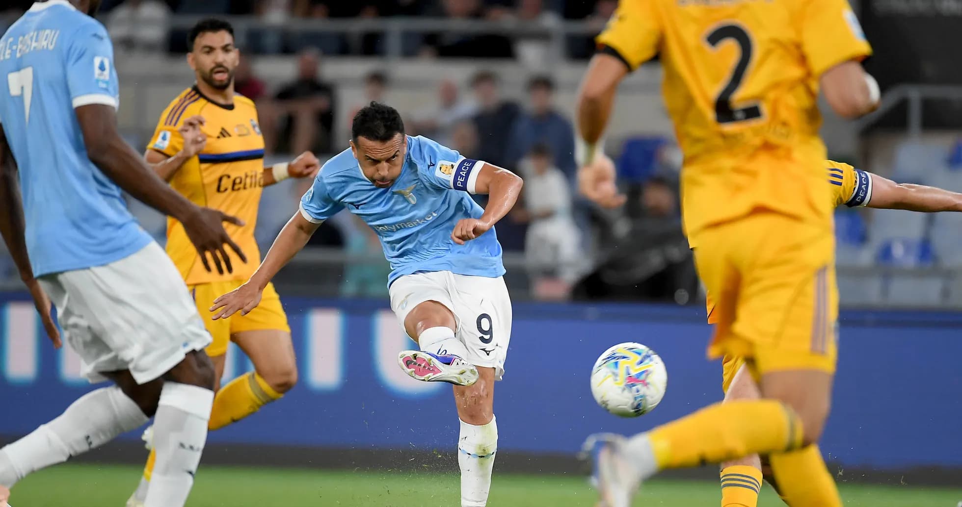 Lazio player striking the ball during match