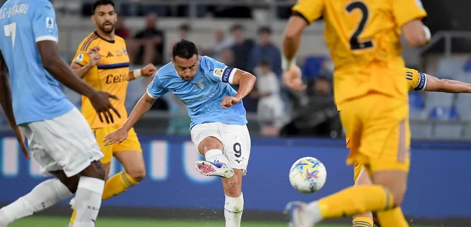 Lazio player striking the ball during match
