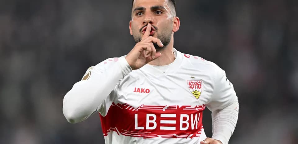 Player celebrating with finger on lips in silence gesture