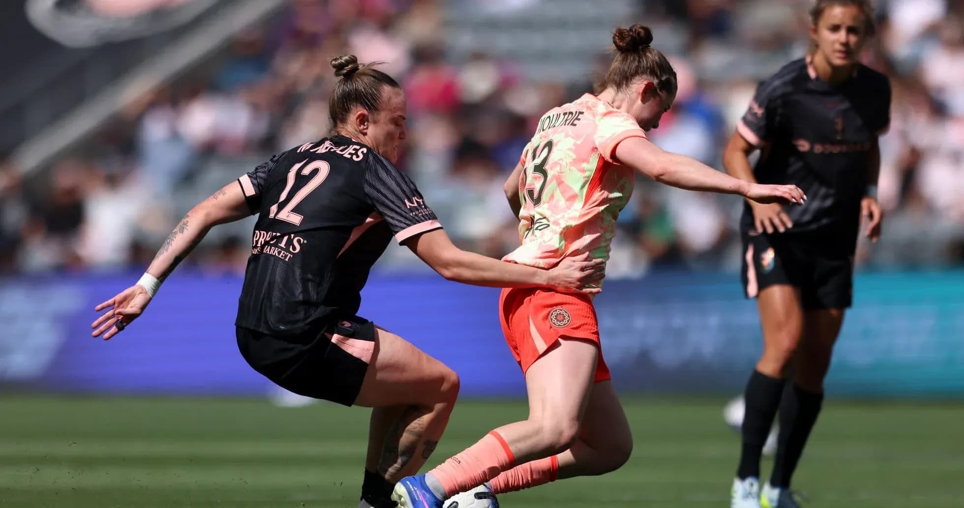 Player competing for the ball during match