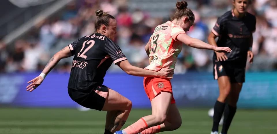 Player competing for the ball during match