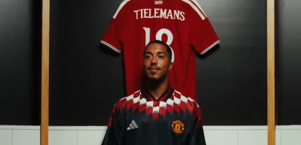Player in Manchester United kit with jersey behind