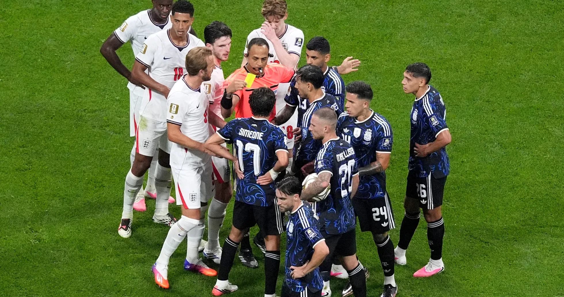Players arguing with referee during England vs Argentina match