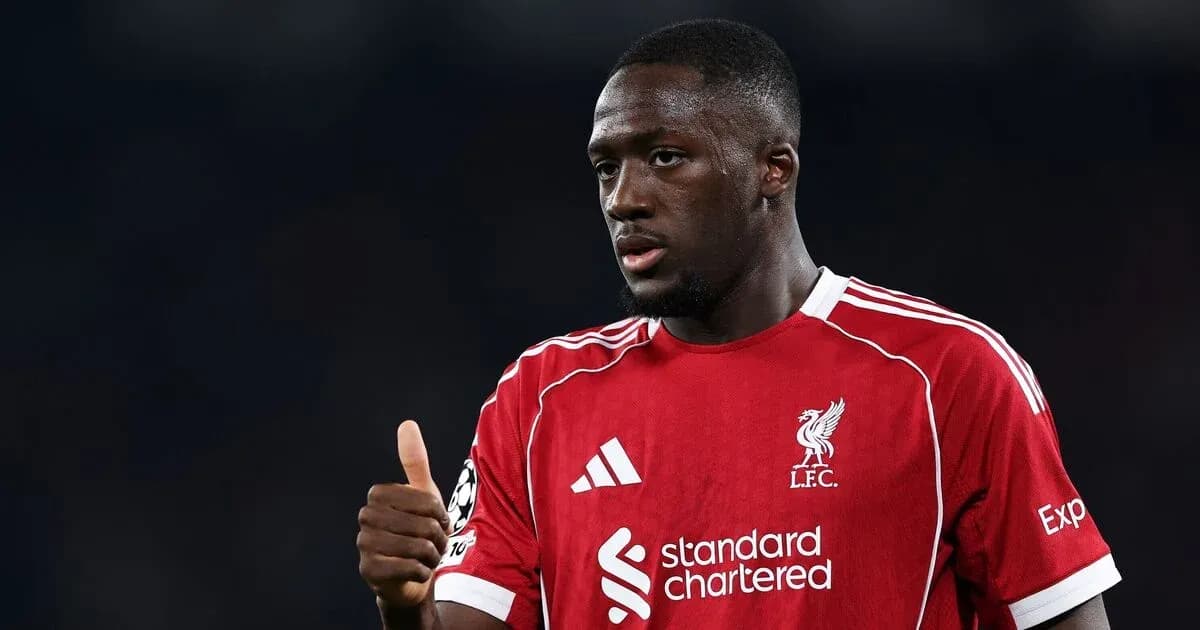 Player in Liverpool jersey giving thumbs up