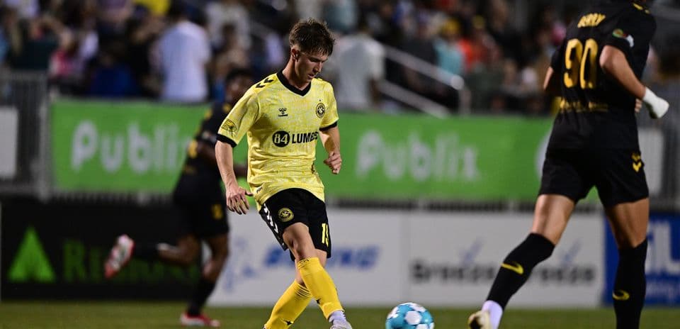 Player dribbling the ball during match