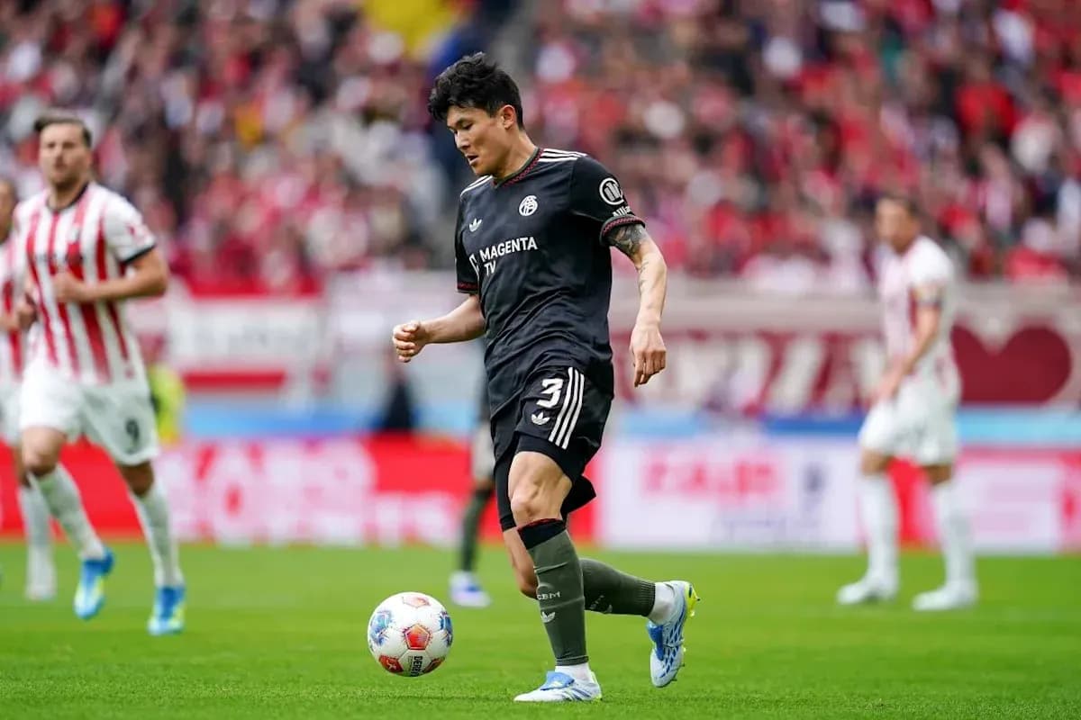 Player dribbling the ball during a soccer match