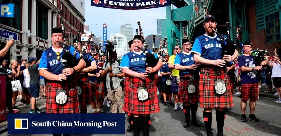 Bagpipers in kilts marching at Fenway Park