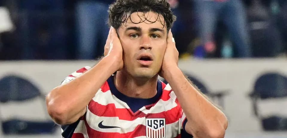 Player in USA jersey reacting during match