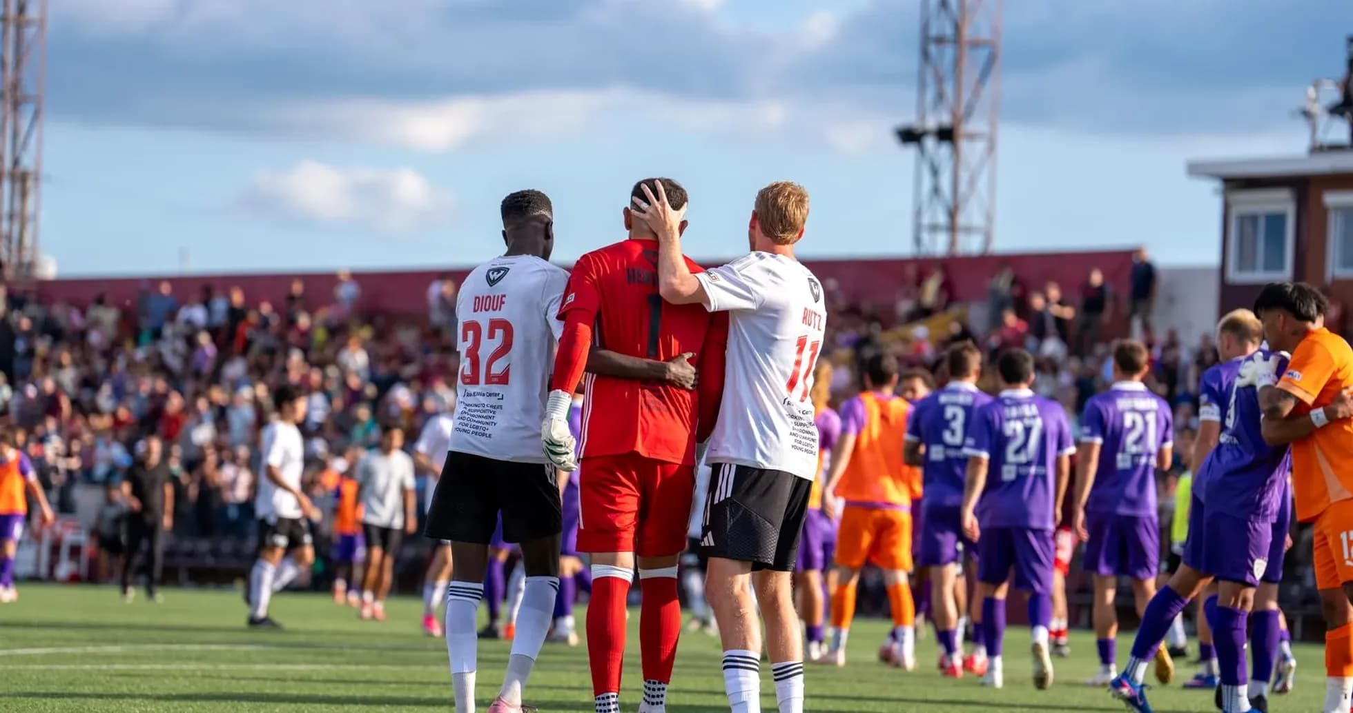 Players interacting after USL League One match