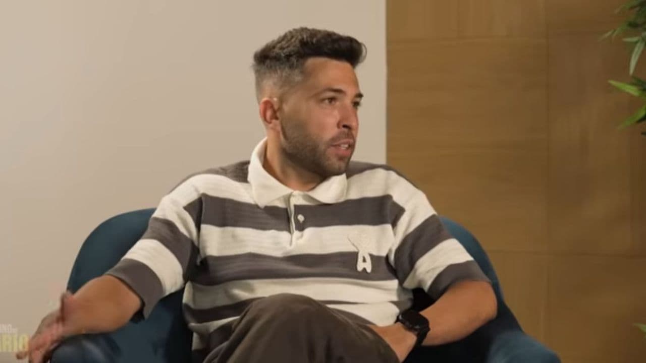 Person speaking during an interview while seated