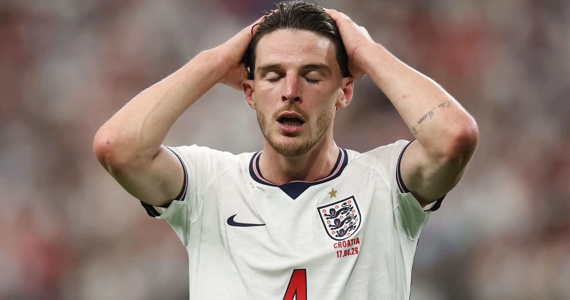 Player holding head in frustration during match