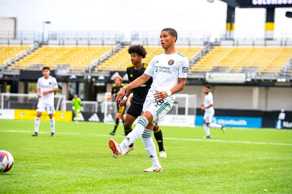 Player kicking the ball during Columbus Crew II match