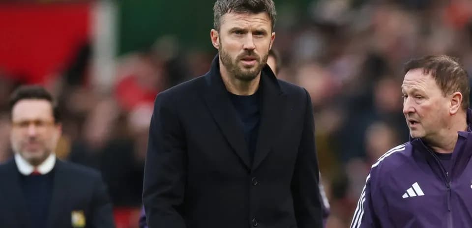 Coaches walking on the sidelines during a match