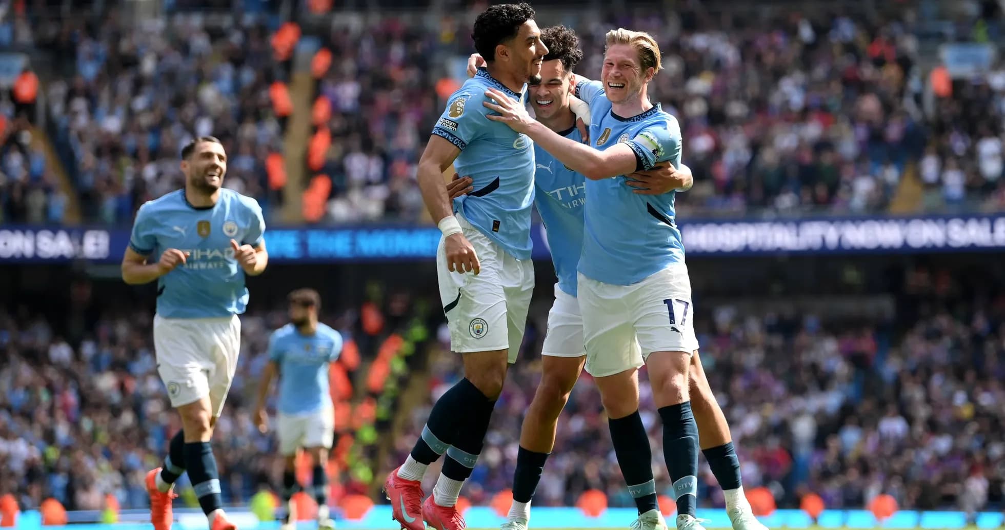 Manchester City players celebrating a goal