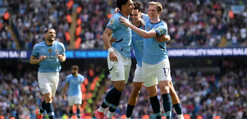 Manchester City players celebrating a goal