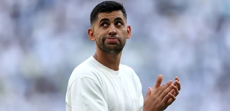 Player clapping during warm-up before the match