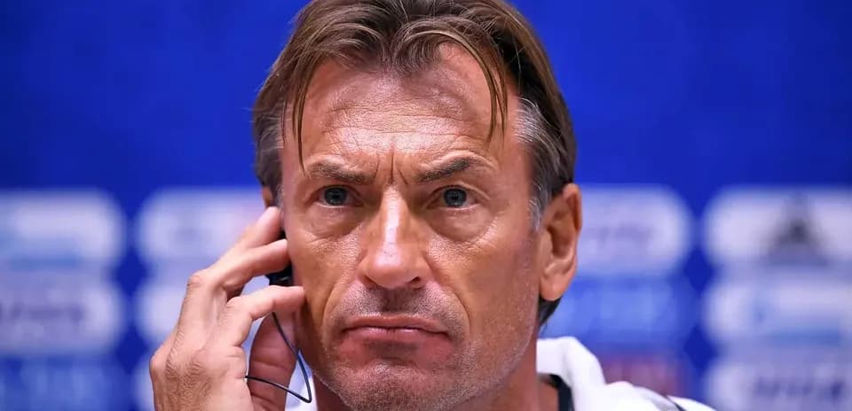 Coach speaking during a press conference