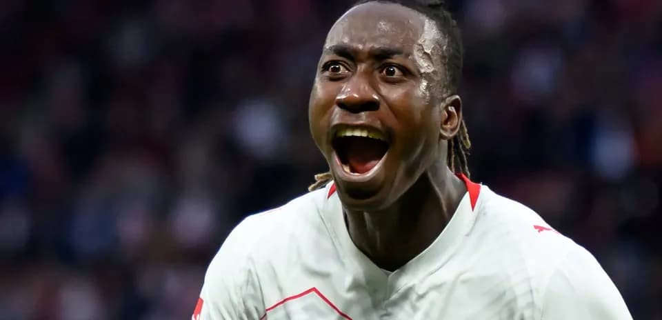Player celebrating passionately after scoring a goal