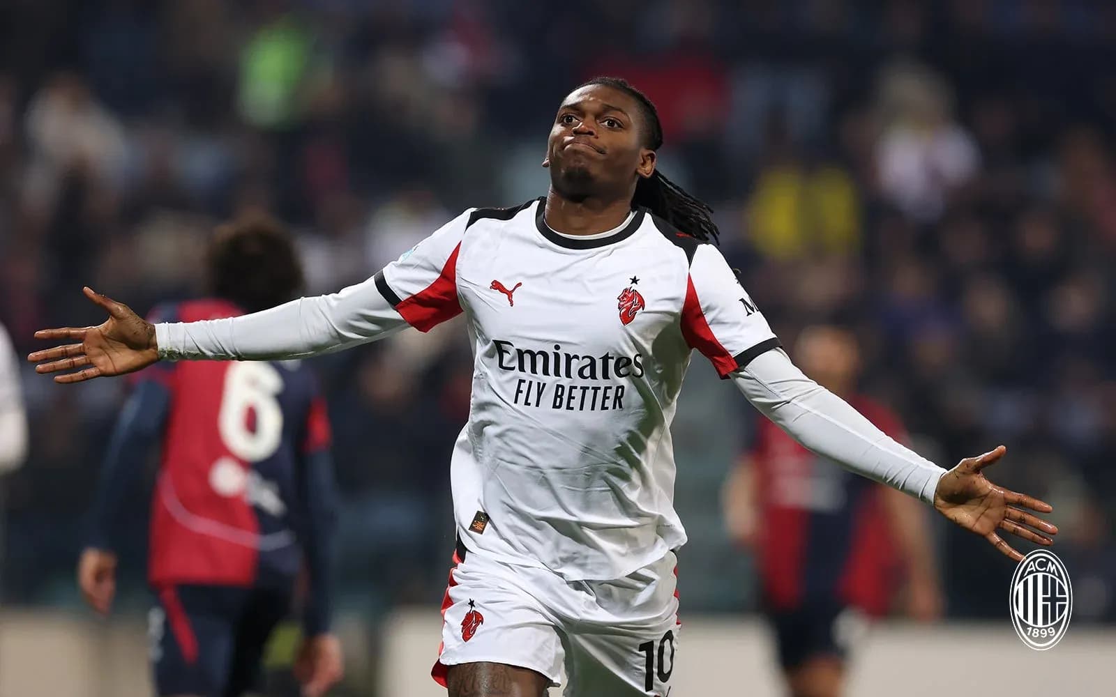 Player celebrating during AC Milan match