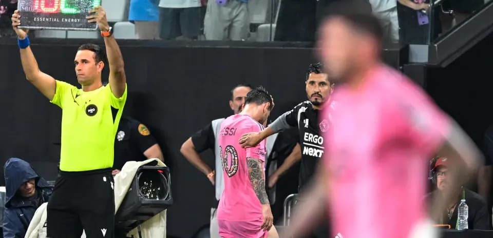 Substitution being made with Messi leaving the field