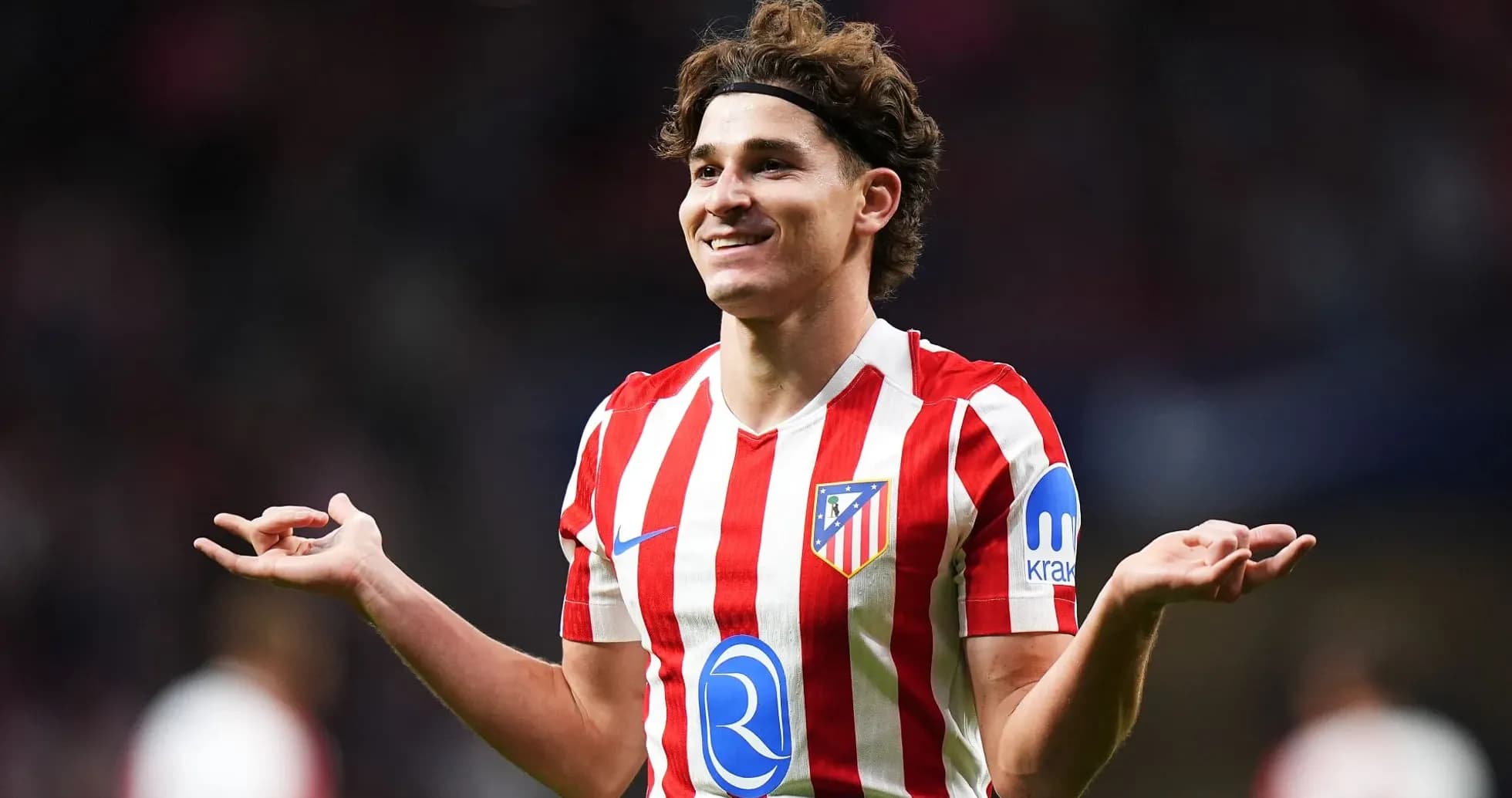 Atletico Madrid player celebrating on the pitch