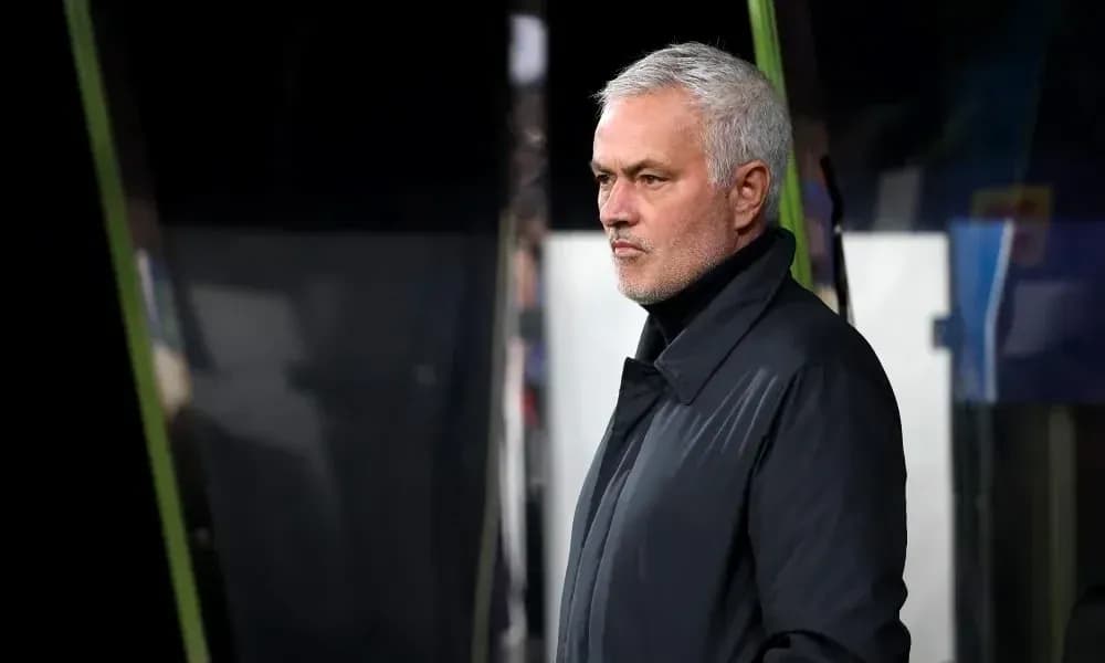 Manager observing the game from the sidelines