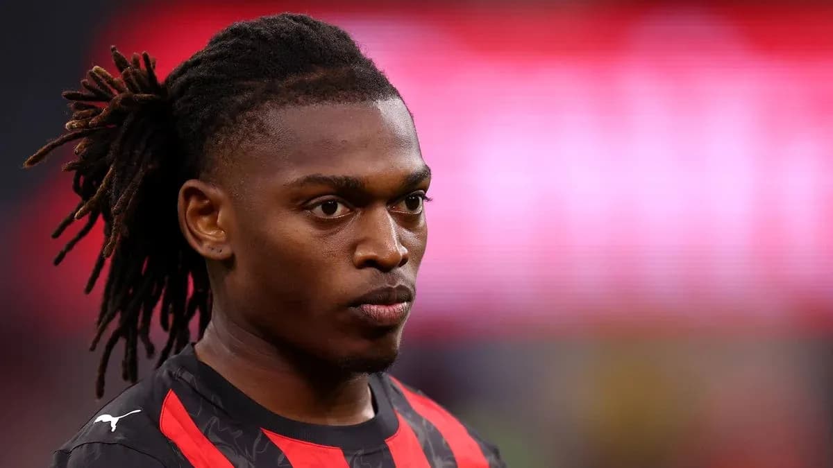 Player in black and red kit during match