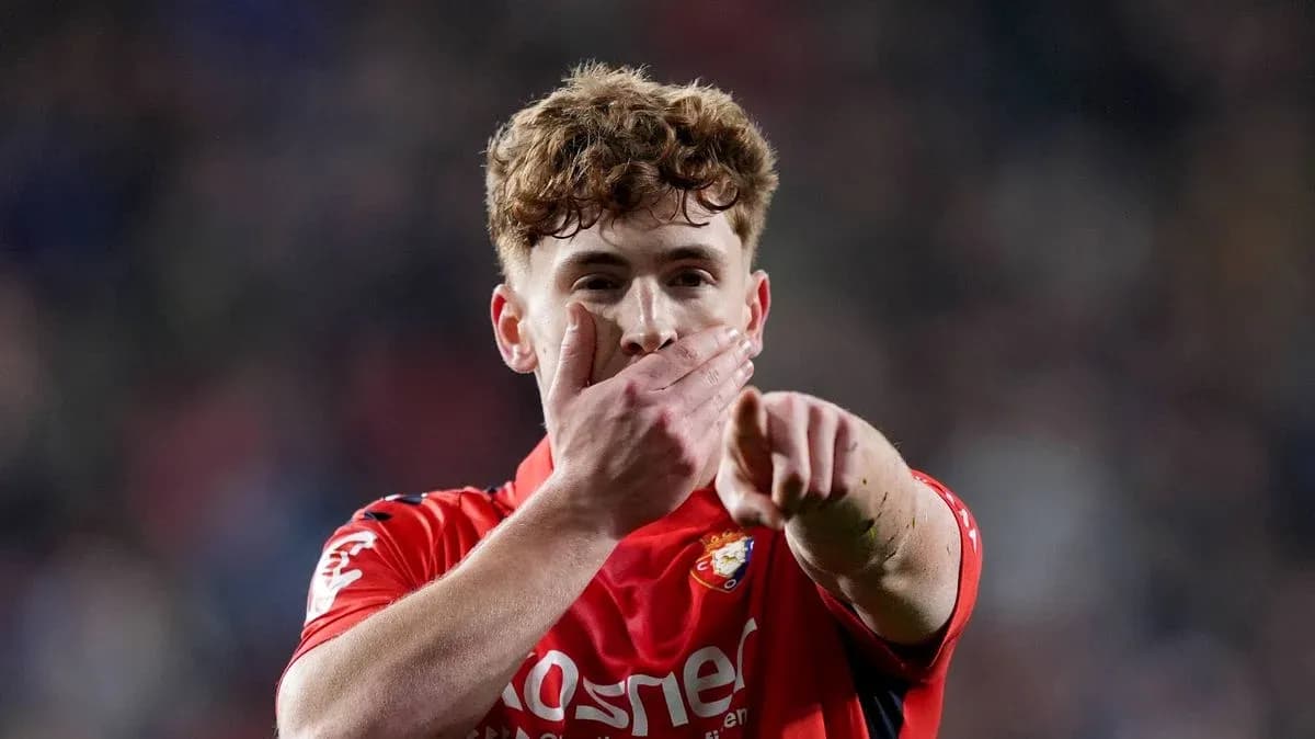 Player celebrating and pointing towards the crowd