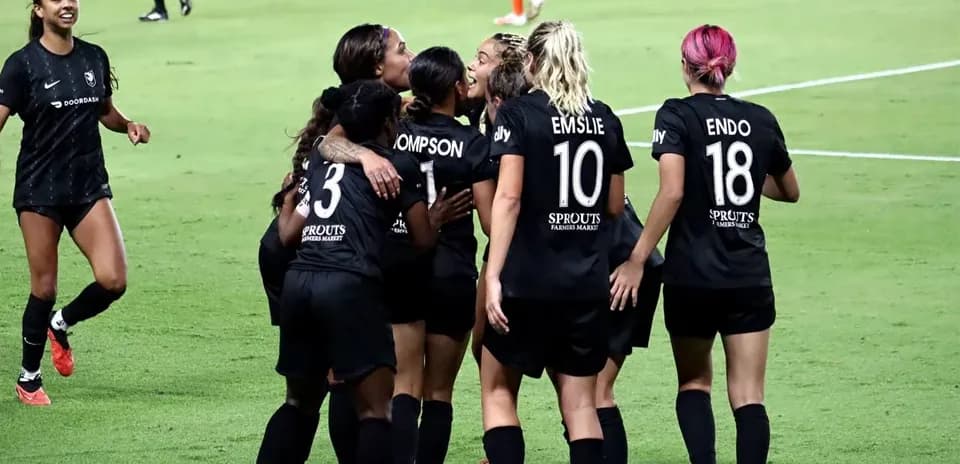 Celebration of Angel City players after a goal