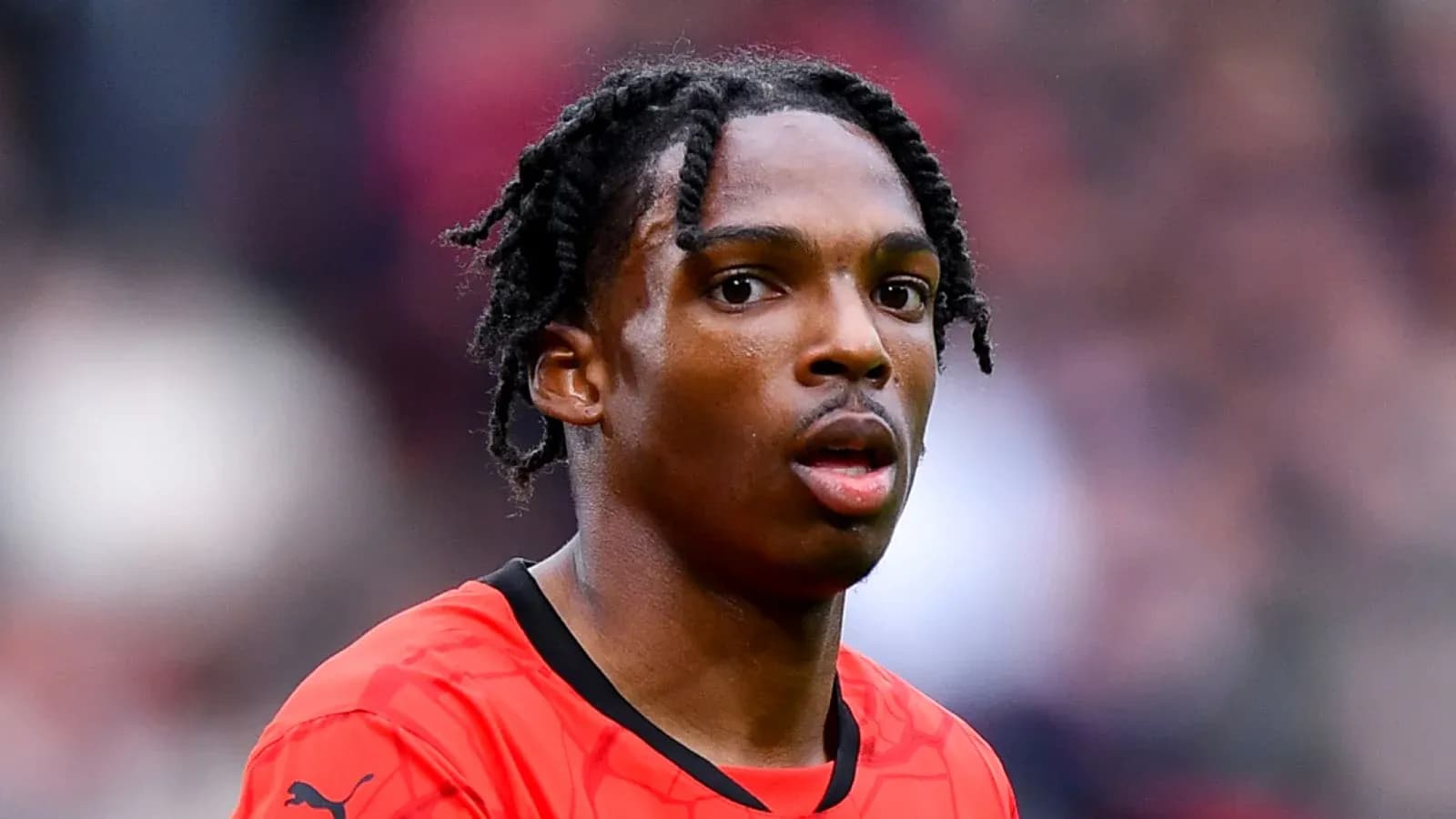 Player in red jersey during match close-up