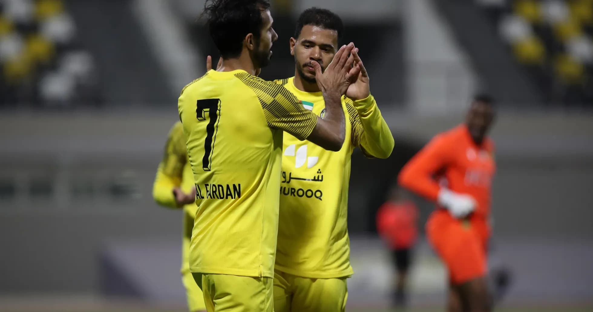 Players celebrating during Ittihad Kalba U23 match