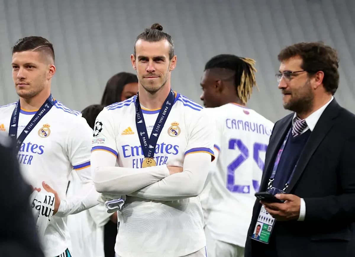 Real Madrid players celebrating with medals after match