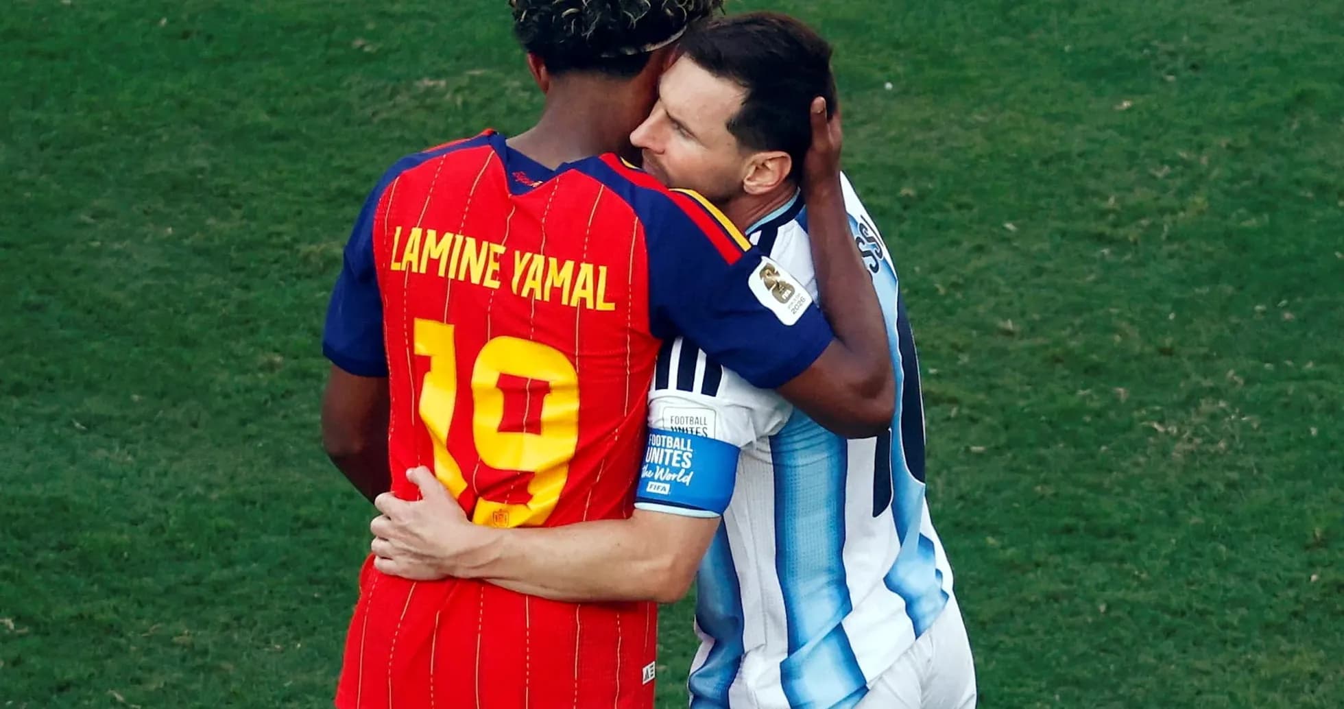Lamine Yamal and Lionel Messi embrace after match