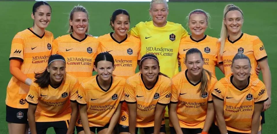 Houston Dash women's team posing for photo