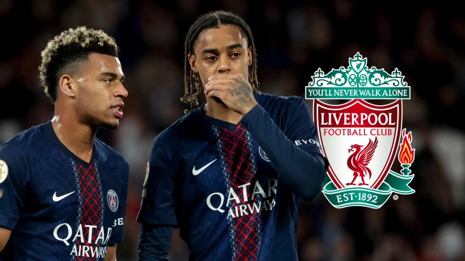 Two players in PSG jerseys during match