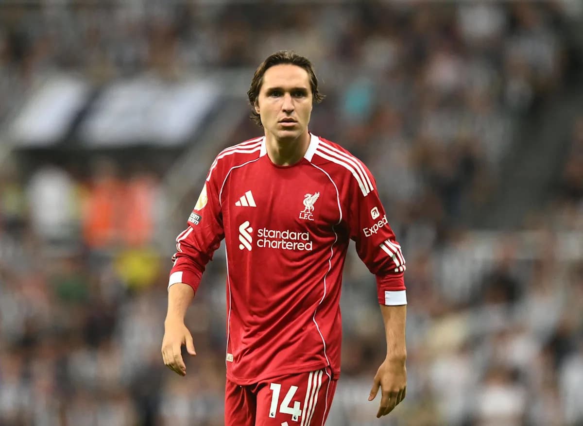 Player in red Liverpool kit on the pitch