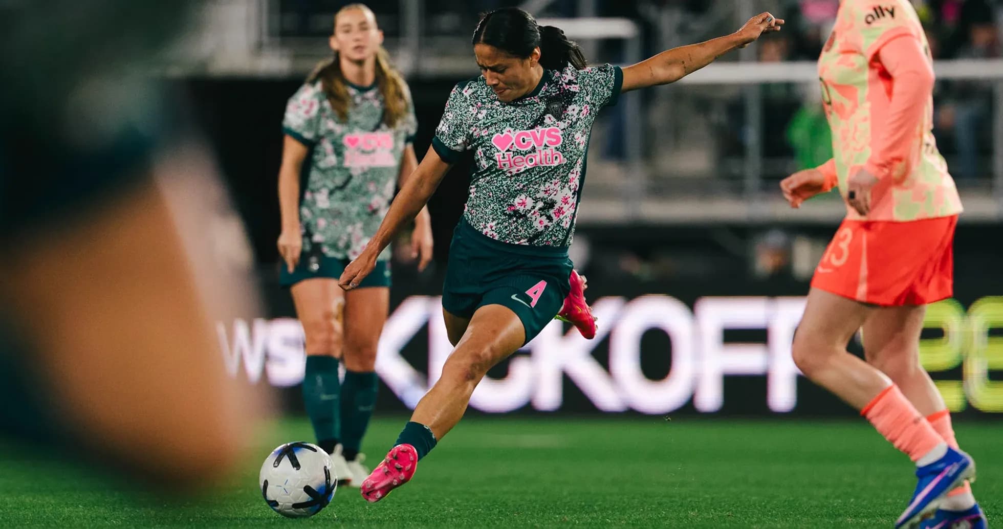 Seattle Reign FC player taking a free kick