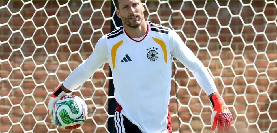 Goalkeeper holding a ball during training session