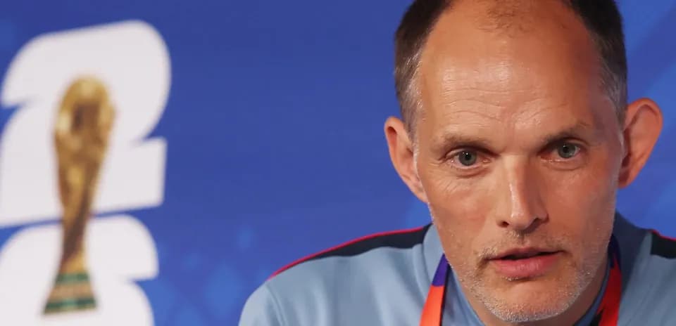 Coach at FIFA World Cup press conference podium