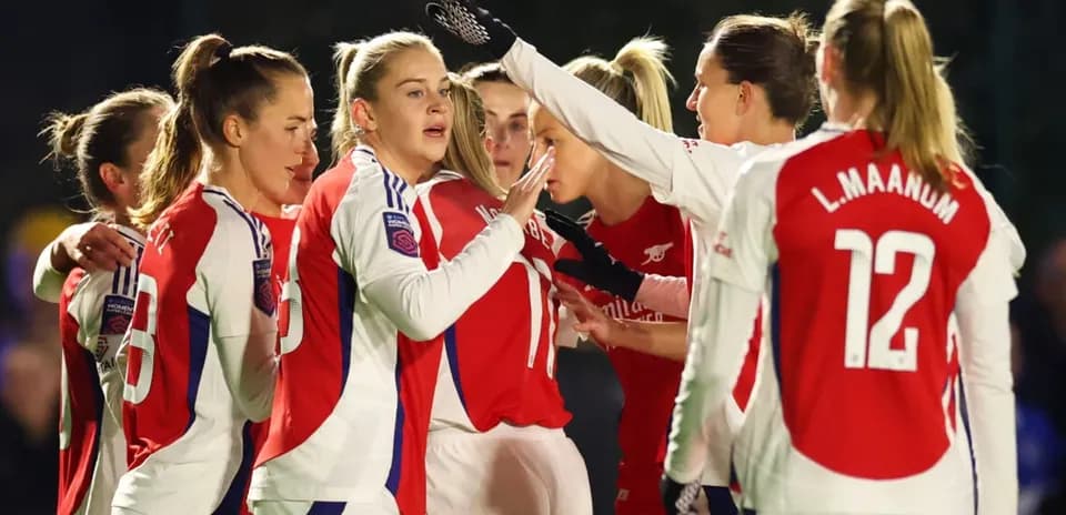 Arsenal Women celebrating a goal together