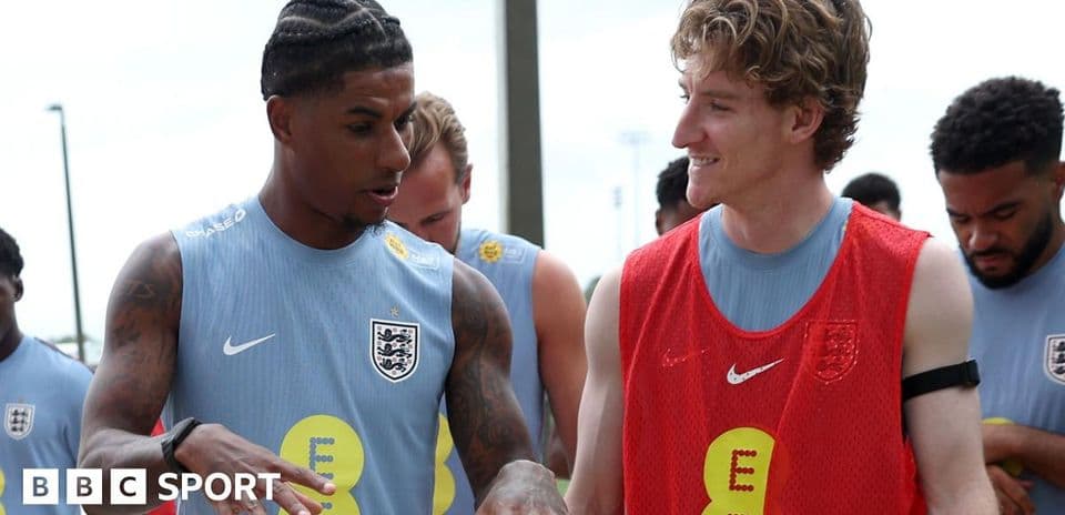 Two players interacting during England training session